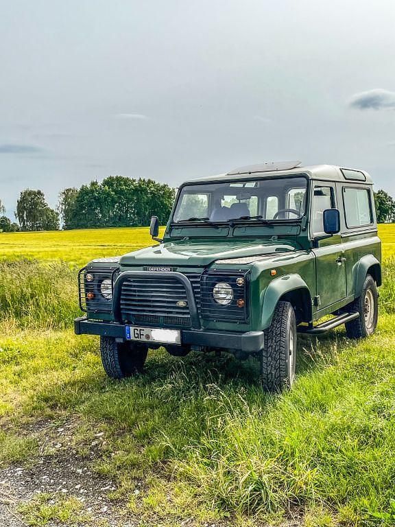 Grün Gebraucht 1998 Land Rover Defender SUV | 22.499 € (Superpreis) - Bild 1/4