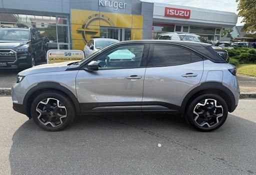 Gebraucht Opel Mokka Ultimate 131 PS (96 kW) 2023 Kontrast grau/quarz silber (metallic) SUV
