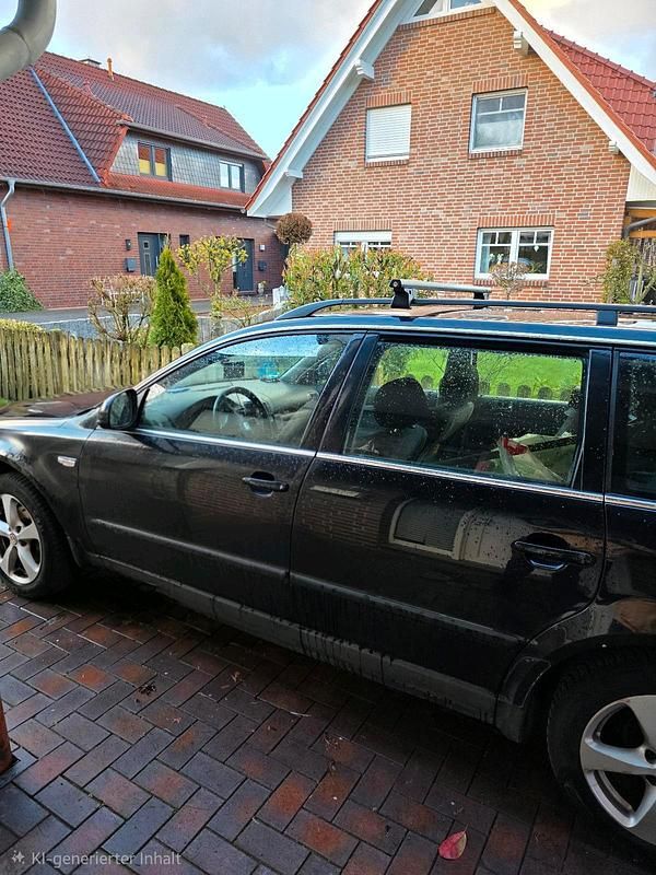 Gebraucht VW Passat 131 PS (96 kW) 2004 Schwarz Kombi