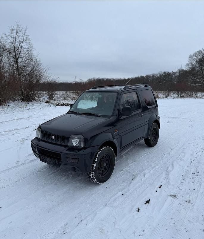 Schwarz Gebraucht 2004 Suzuki Jimny SUV | 6.500 € (Teuer) - Bild 1/4