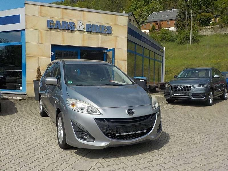 Grau Gebraucht 2011 Mazda 5 Center-Line Van / Kleinbus | 6.990 € (Fairer Preis) - Bild 1/4