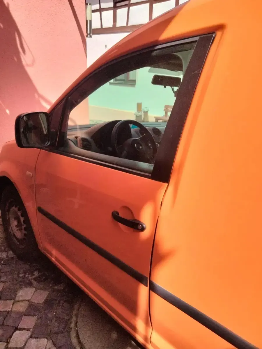 Second-hand VW Caddy 78 CP (57 kW) 2013 Portocaliu Monovolum