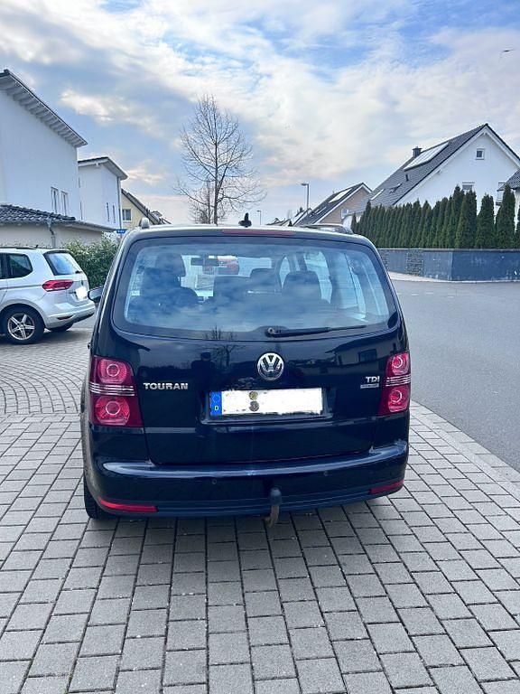 Gebraucht VW Touran 105 PS (77 kW) 2010 Schwarz Van / Kleinbus