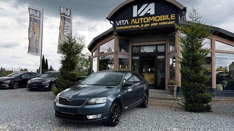 Grau Gebraucht 2014 Skoda Rapid Ambition Limousine | 4.900 € (Fairer Preis) - Bild 1/4