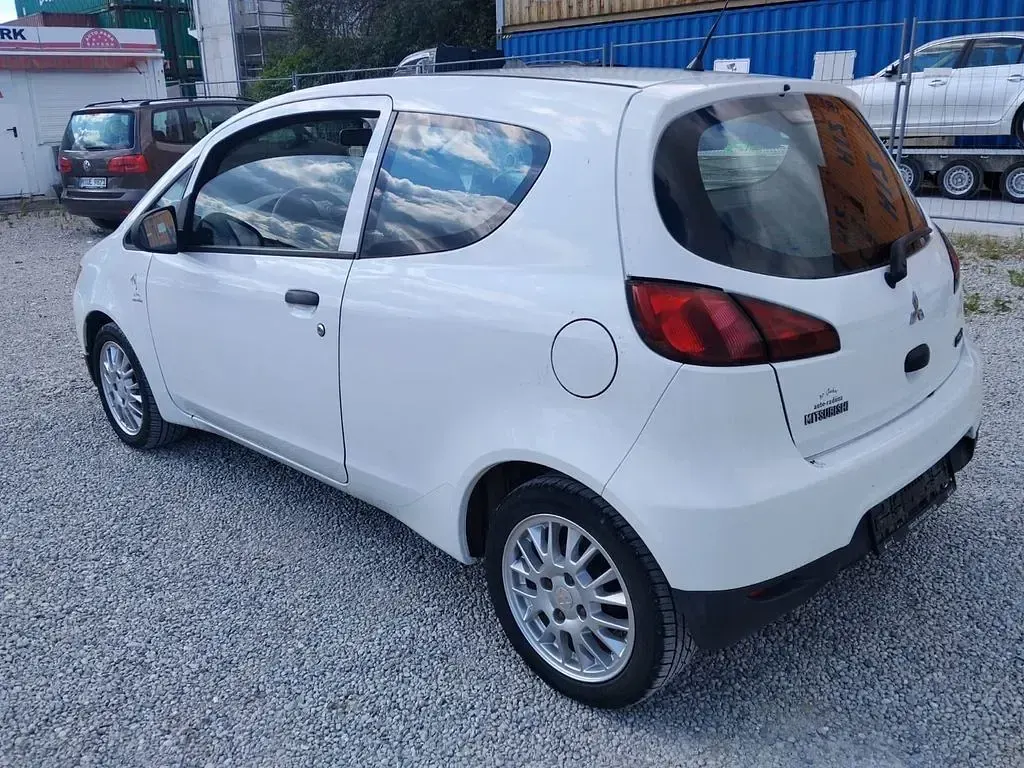 Gebraucht Mitsubishi Colt 75 PS (55 kW) 2010 Weiß Kleinwagen