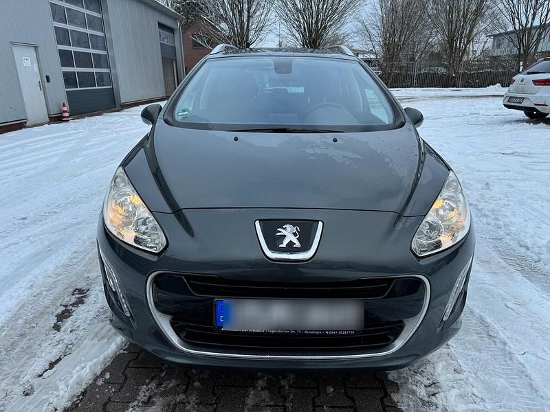 Gebraucht Peugeot 308 114 PS (83 kW) 2013 Grau Kombi