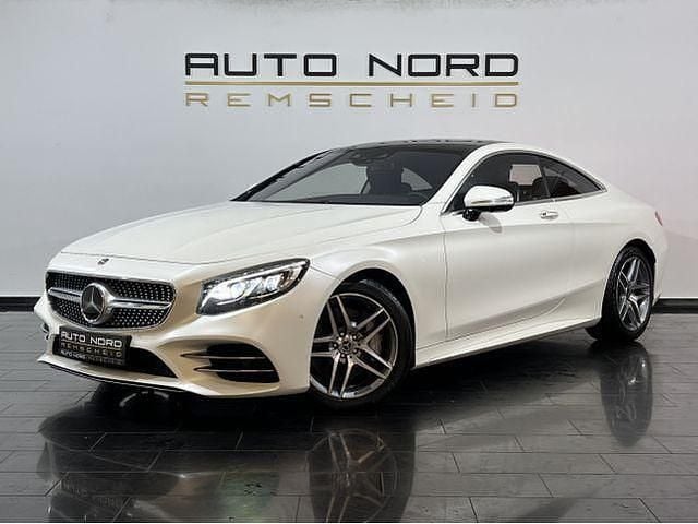 Designo magno weiß Gebraucht 2020 Mercedes 560 AMG Coupé | 71.990 € - Bild 1/4