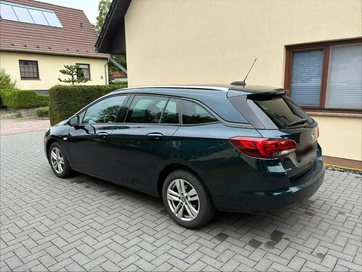 Gebraucht Opel Astra Active 125 PS (91 kW) 2017 Grün Kombi