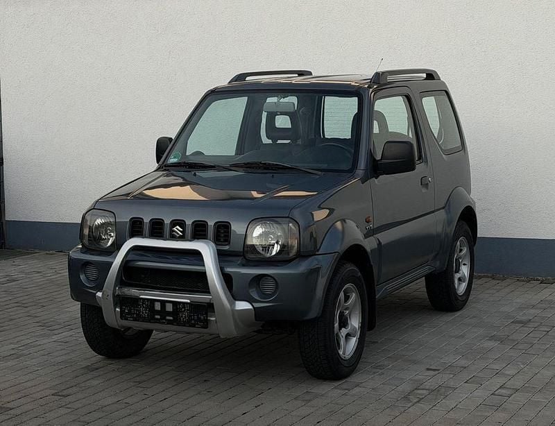 Grau Gebraucht 2005 Suzuki Jimny Comfort SUV | 7.450 € (Fairer Preis) - Bild 1/4