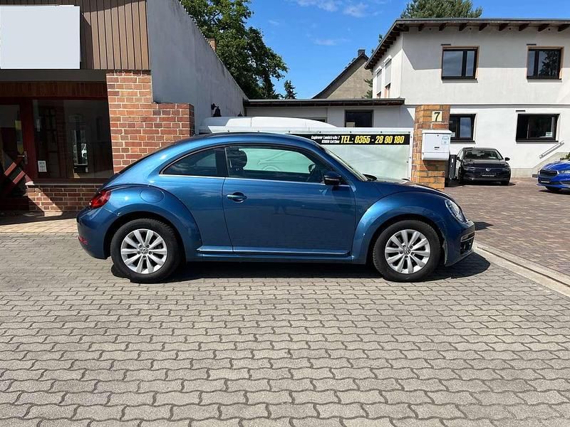 Blue silk metallic Gebraucht 2016 VW Beetle Design Limousine | 12.199 € (Fairer Preis) - Bild 1/4