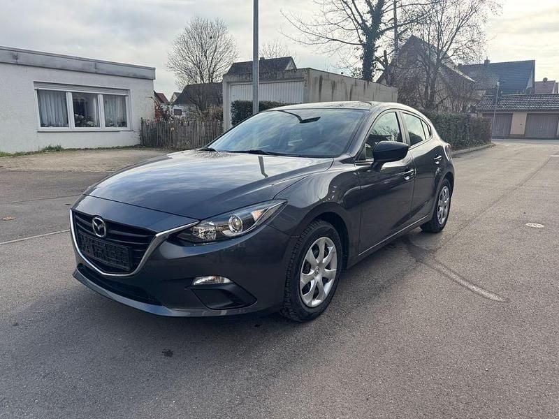 Grau Gebraucht 2016 Mazda 3 Prime-Line Limousine | 10.480 € (Guter Preis) - Bild 1/4
