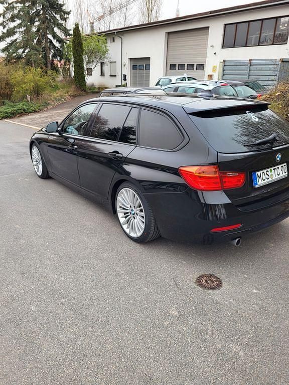 Schwarz Gebraucht 2015 BMW 320 Sport Line Kombi | 10.199 € (Guter Preis) - Bild 1/4