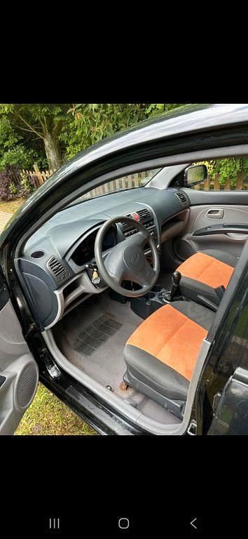 Second-hand Kia Picanto LX 65 CP (47 kW) 2007 Portocaliu Hatchback