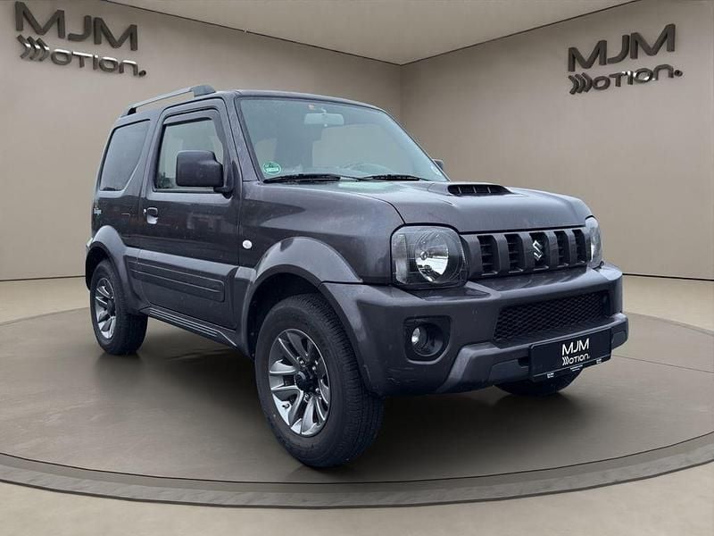 Schwarz Gebraucht 2018 Suzuki Jimny Style SUV | 18.900 € (Superpreis) - Bild 1/4