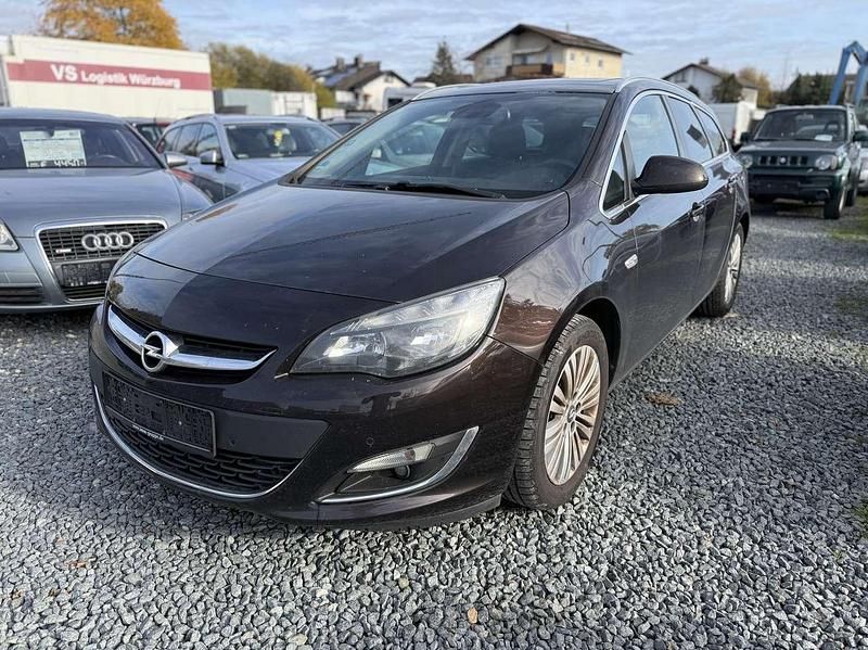 Mahagonibraun/darkmahagony Gebraucht 2014 Opel Astra Exklusiv Kombi | 2.899 € (Fairer Preis) - Bild 1/4