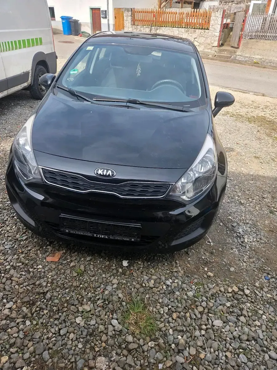 Gebraucht Kia Rio 84 PS (61 kW) 2014 Schwarz Kleinwagen