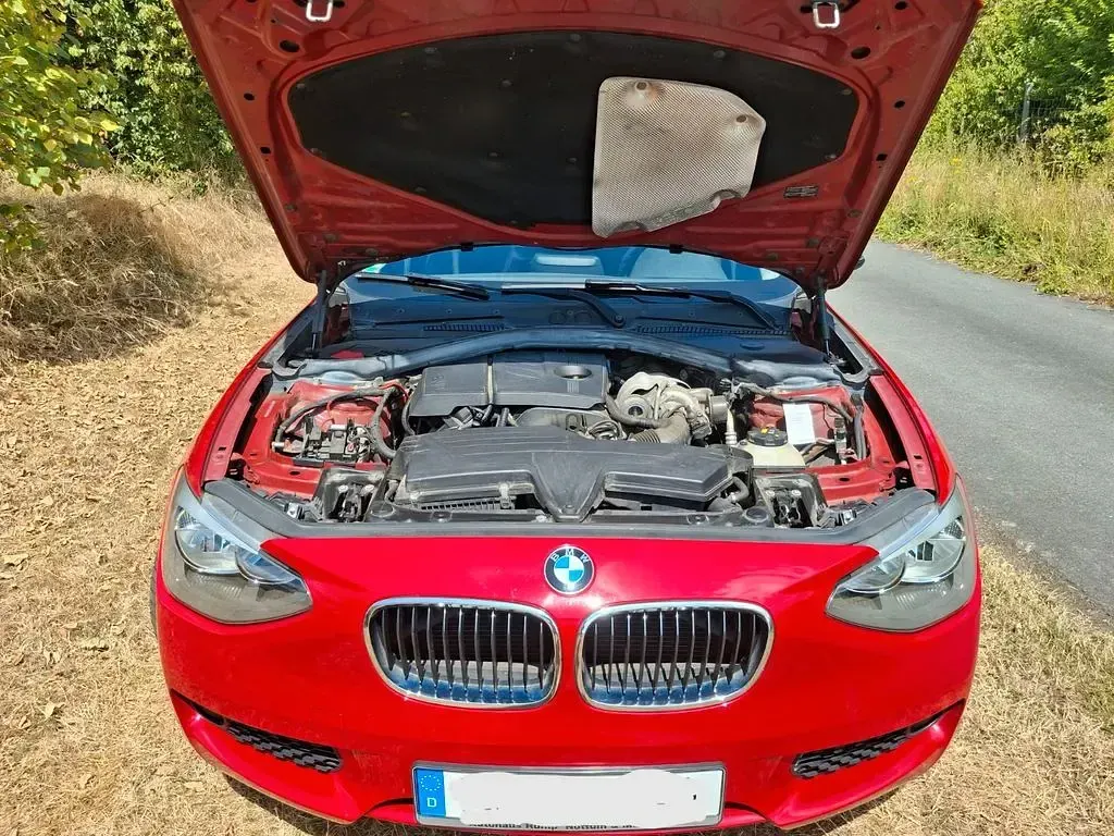 Gebraucht BMW 114 102 PS (75 kW) 2014 Rot Kleinwagen