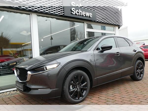 Grau (machine grey) Neu 2025 Mazda CX-30 Homura-Line SUV | 26.210 € - Bild 1/4