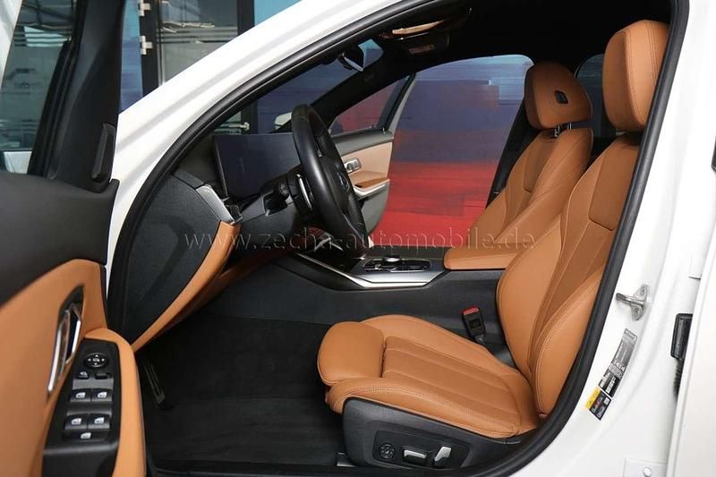 Gebraucht BMW 330e Performance 292 PS (214 kW) 2022 Alpinweiss iii (300) Kombi