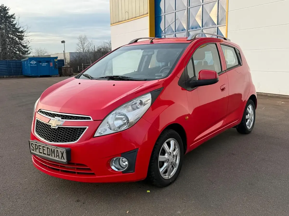 Second-hand Chevrolet Spark 82 CP (60 kW) 2013 Roșu Hatchback