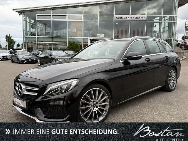 Schwarz metallic Gebraucht 2018 Mercedes C200 AMG Kombi | 22.900 € (Fairer Preis) - Bild 1/4