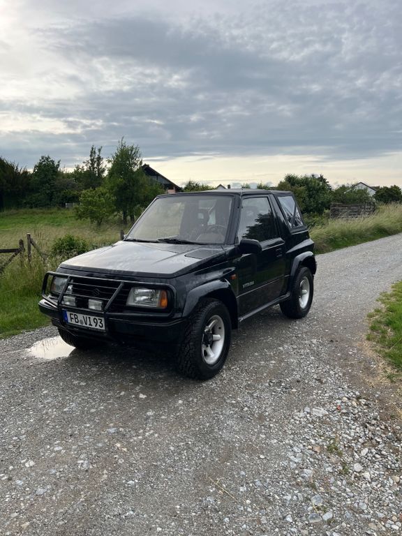 Schwarz Gebraucht 1993 Suzuki Vitara SUV | 6.099 € - Bild 1/4