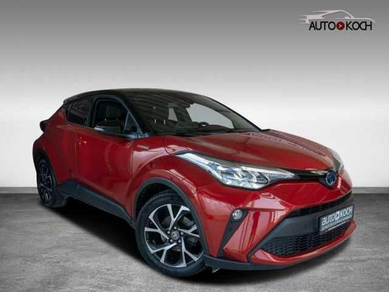Karminarot metallic (metallic) Gebraucht 2020 Toyota C-HR+ Team SUV | 18.990 € - Bild 1/4
