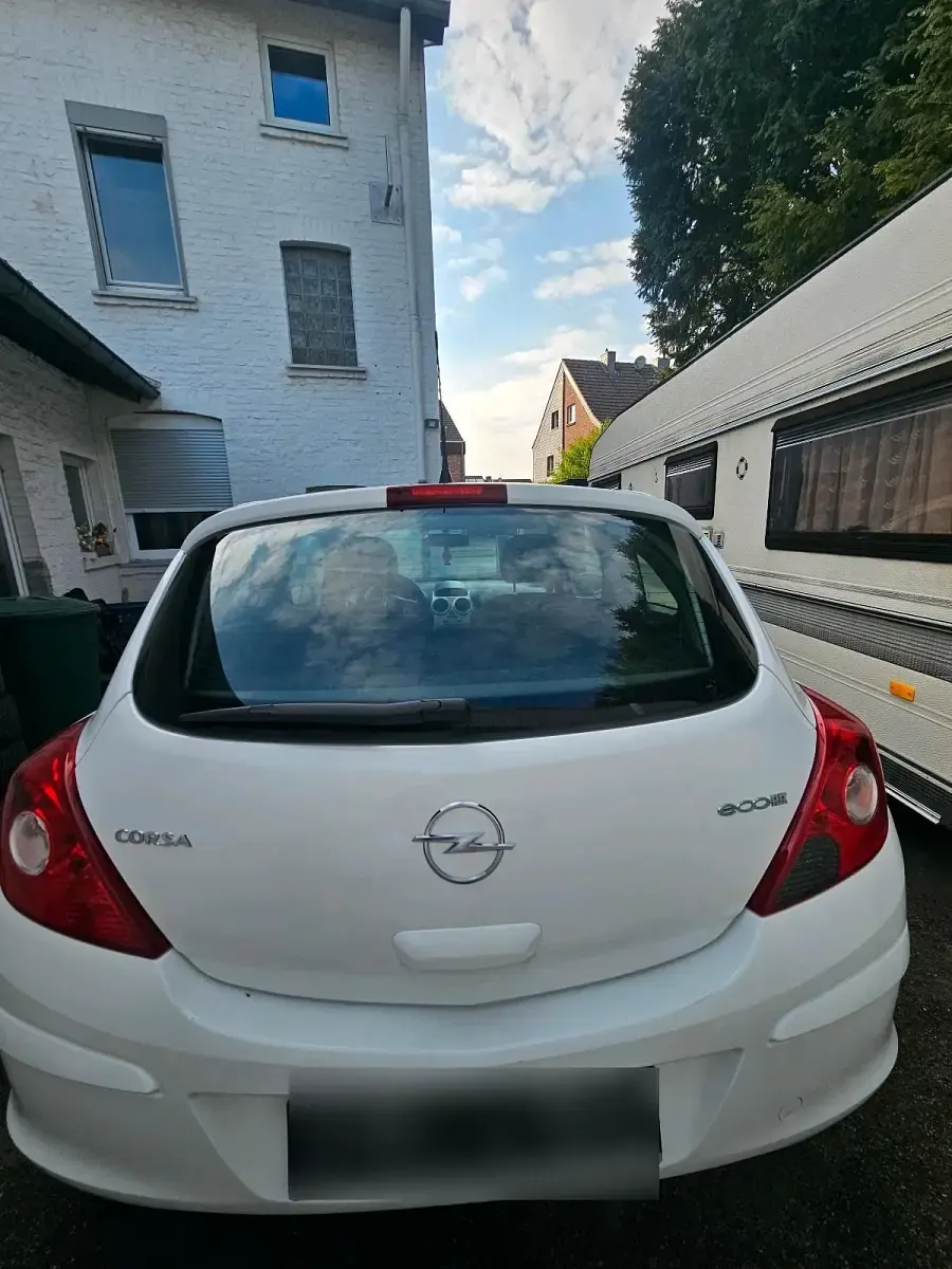 Gebraucht Opel Corsa 60 PS (44 kW) 2009 Weiß Kleinwagen