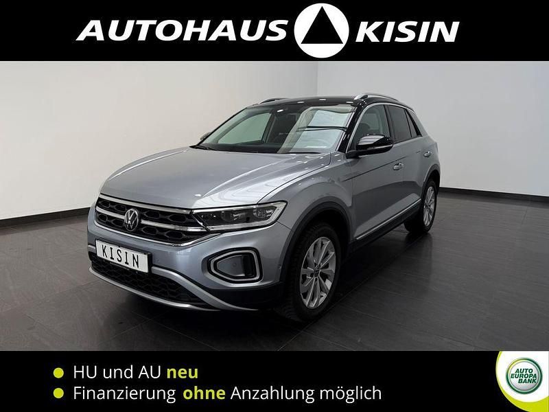 Pyritsilber metallic Gebraucht 2024 VW T-Roc Style SUV | 28.299 € (Fairer Preis) - Bild 1/4