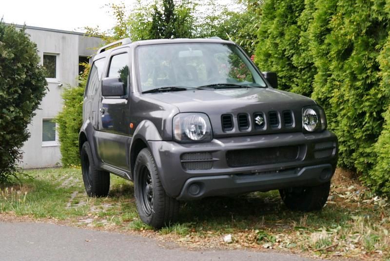 Grau Gebraucht 2009 Suzuki Jimny Comfort SUV | 8.500 € (Fairer Preis) - Bild 1/4