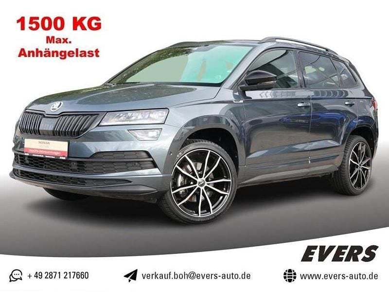 Quarz grau metallic Gebraucht 2021 Skoda Karoq SportLine SUV | 28.530 € (Fairer Preis) - Bild 1/4