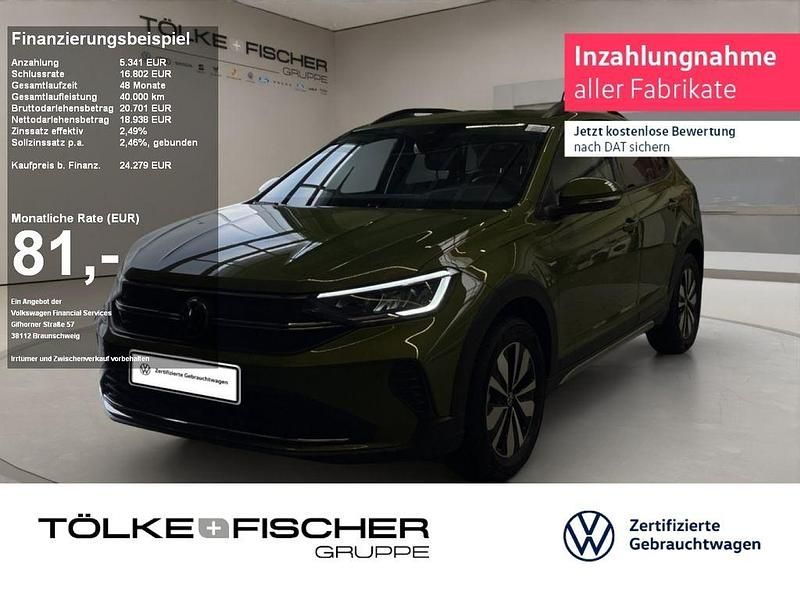 Visual green (metallic) Gebraucht 2024 VW Taigo Move SUV | 24.279 € (Fairer Preis) - Bild 1/4