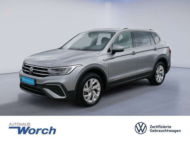 Pyritsilber metallic Gebraucht 2024 VW Tiguan Allspace Life SUV | 35.890 € (Superpreis) - Bild 1/3