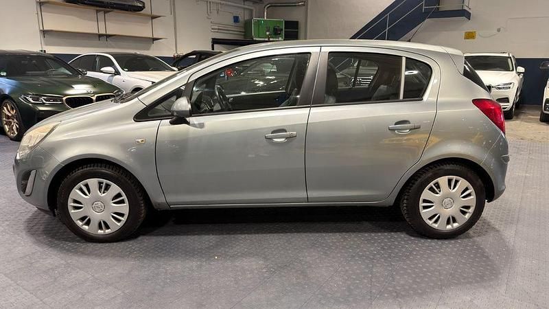 Second-hand Opel Corsa 131 CP (96 kW) 2013 Argintiu Hatchback