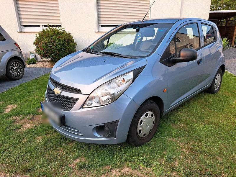Grau Gebraucht 2010 Chevrolet Spark Kleinwagen | 2.099 € (Fairer Preis) - Bild 1/4