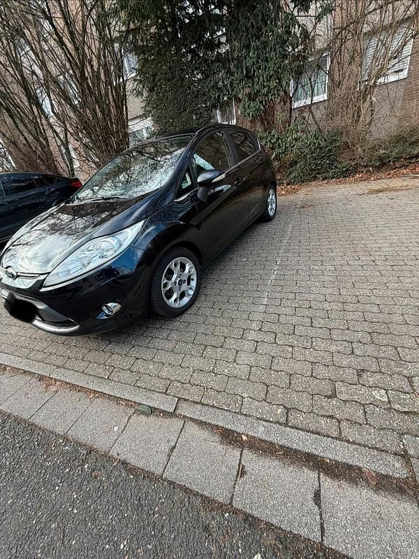 Gebraucht Ford Fiesta 75 PS (55 kW) 2011 Schwarz Kleinwagen