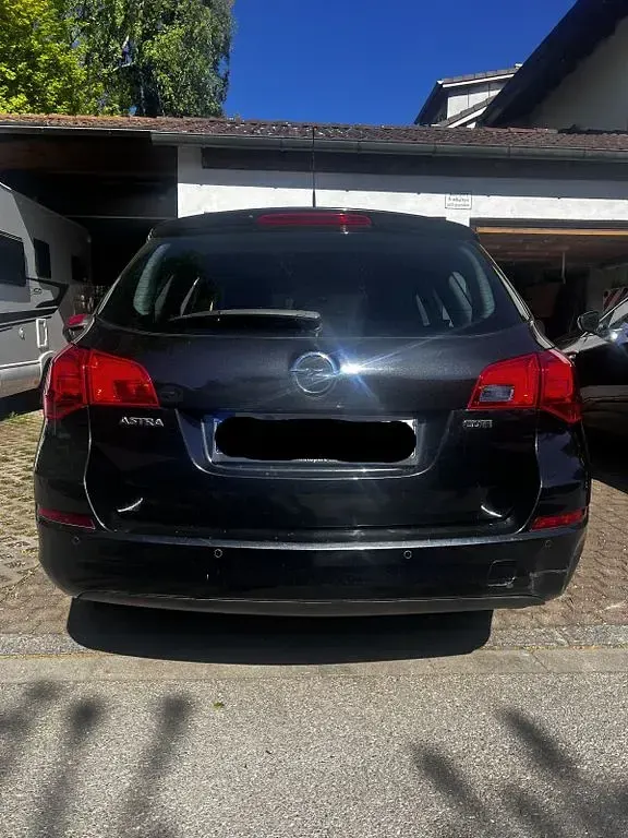 Gebraucht Opel Astra 125 PS (91 kW) 2012 Schwarz Kombi