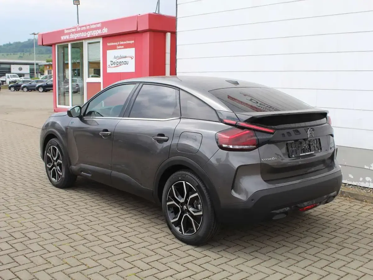 Używany Citroën e-C4 Shine 100 kW (136 KM) 2023 Szary Sedan/Limuzyna