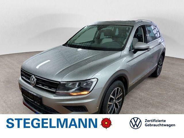Tungsten silver metallic Gebraucht 2019 VW Tiguan Comfortline SUV | 22.780 € (Guter Preis) - Bild 1/4