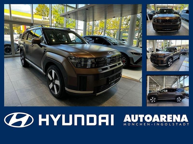 Earthy brass / mat Gebraucht 2024 Hyundai Santa Fe Signature SUV | 46.975 € (Teuer) - Bild 1/4