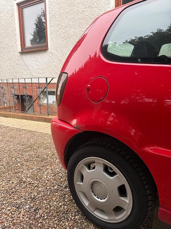 Używany VW Polo 60 KM (44 kW) 1997 Czerwony Hatchback