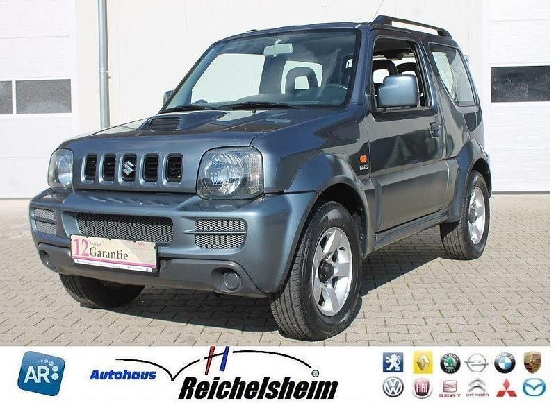 Grau Gebraucht 2006 Suzuki Jimny SUV | 10.999 € (Teuer) - Bild 1/4