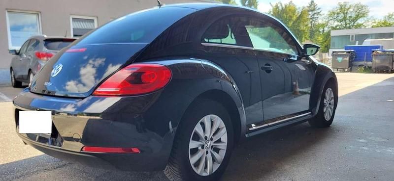 Gebraucht VW Beetle 105 PS (77 kW) 2013 Schwarz Kleinwagen