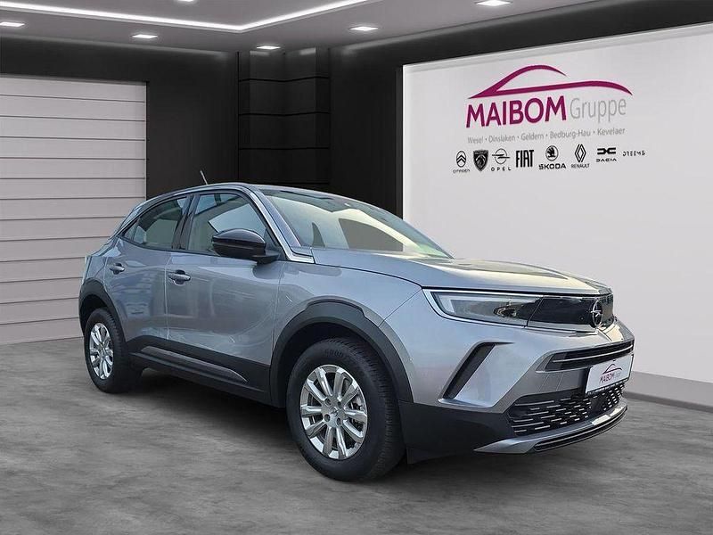 Gebraucht Opel Mokka-e Edition 100 kW (136 PS) 2022 Kontrast grau/quarz silber SUV