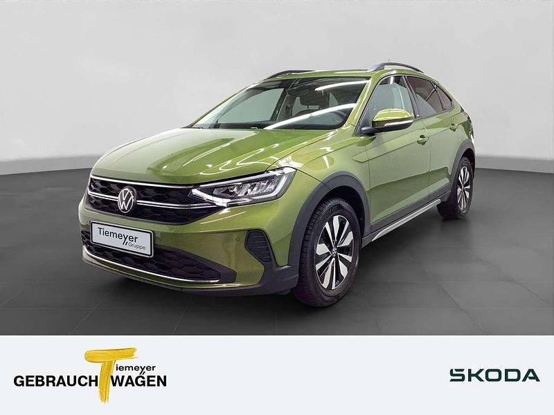 Grün Gebraucht 2024 VW Taigo Move SUV | 20.480 € (Guter Preis) - Bild 1/4