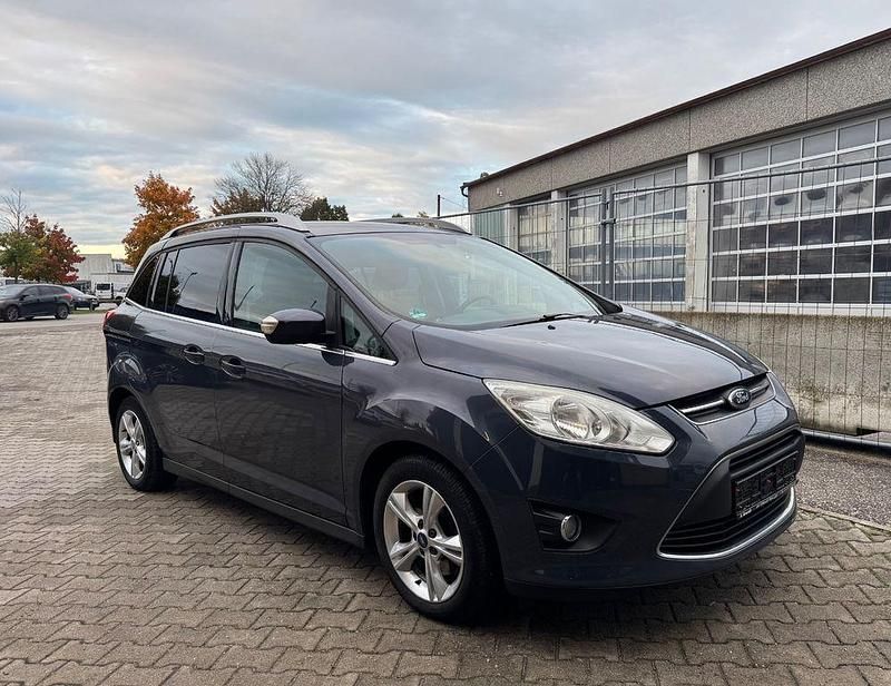 Grau Gebraucht 2012 Ford Grand C-Max Champions Edition Van / Kleinbus | 5.999 € (Guter Preis) - Bild 1/4