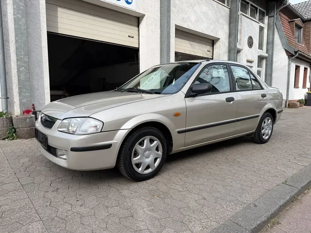 Second-hand Mazda 323 88 CP (64 kW) 1999 Gri Berlinǎ