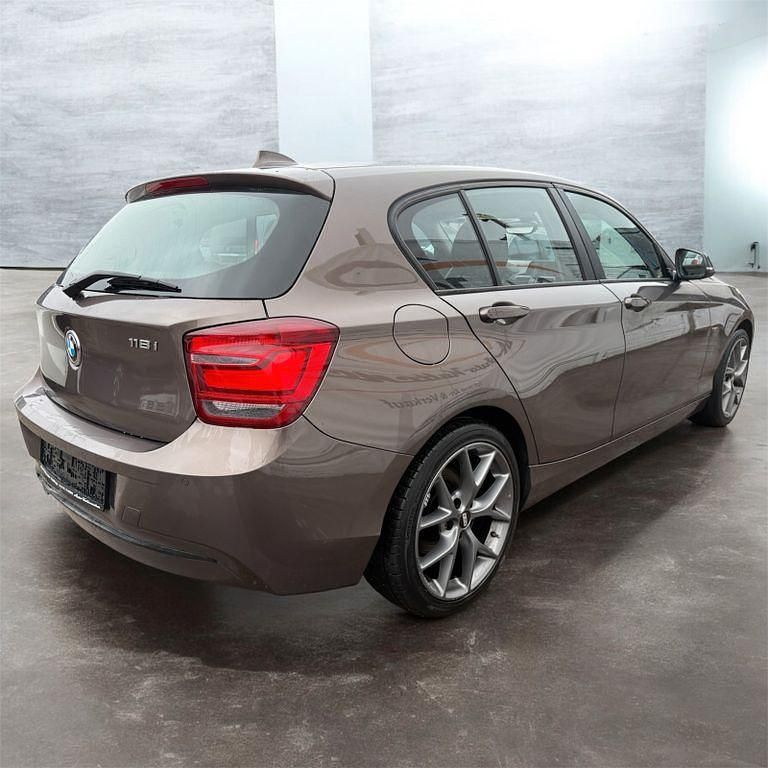 Gebraucht BMW 118 Sport Line 170 PS (125 kW) 2014 Sparkling bronze metallic Kleinwagen