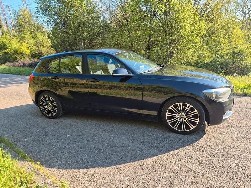 Second-hand BMW 116 116 CP (85 kW) 2012 Negru Hatchback