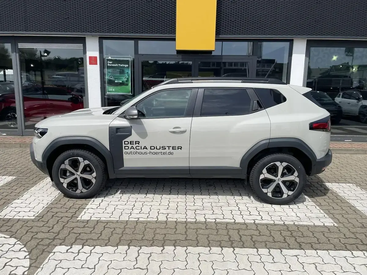 Gebraucht Dacia Duster Journey 154 PS (113 kW) 2026 Sandstone (beige)